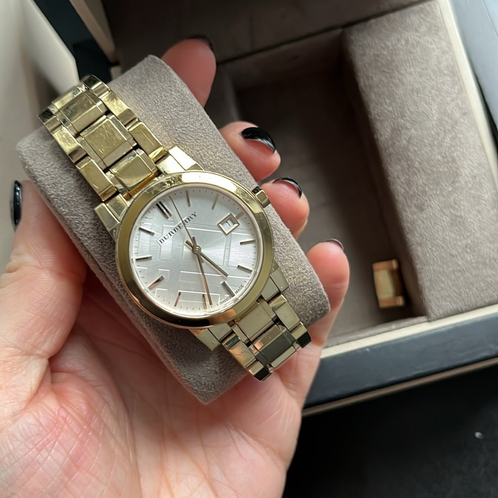 Great condition Burberry 34 mm stainless steel gold watch